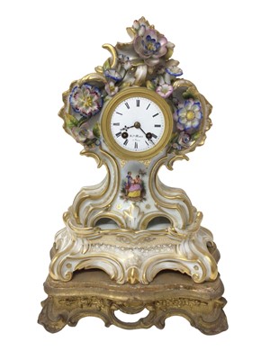 Lot 655 - 19th century French porcelain mantel clock