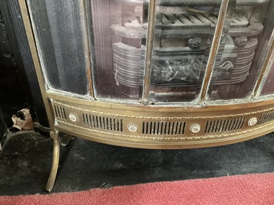 Lot 1257 - Bowed glass and brass firescreen