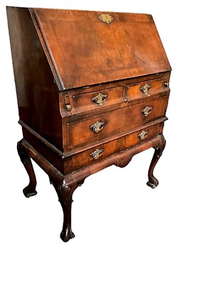 Lot 1256 - Queen Anne style walnut feather banded bureau