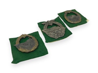 Lot 719 - Group of three Second World War Nazi Kriegsmarine badges.