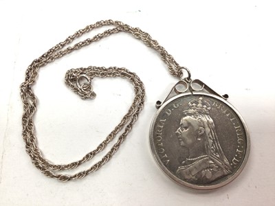 Lot 1074 - Victorian 1889 crown in silver pendant mount on chain