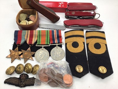 Lot 364 - WWII medal group comprising 1939-1945 star, Africa star, Defence and War medals, together with Naval buttons, epaulettes, various Swiss Army knives and coins