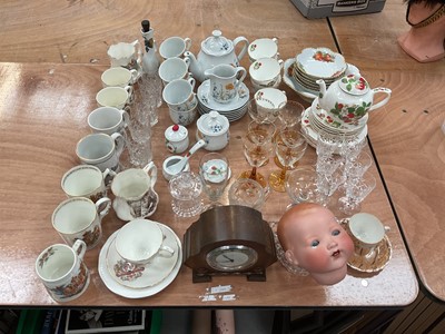 Lot 514 - German porcelain teaset, another teaset, Armand Marseille dolls head and other china and glassware together with an oak clock.