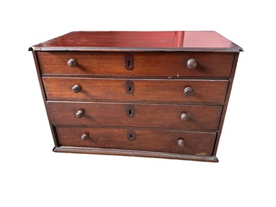 Lot 1260 - Regency mahogany miniature chest of four long drawers, with bun handles, 47cm wide