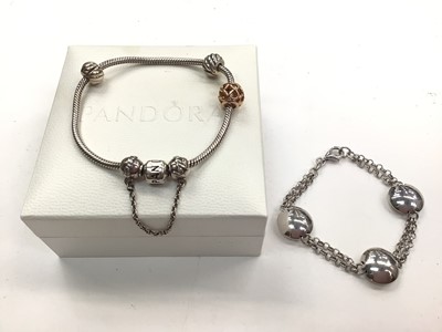 Lot 1028 - Pandora silver charm bracelet in box and one other silver bracelet