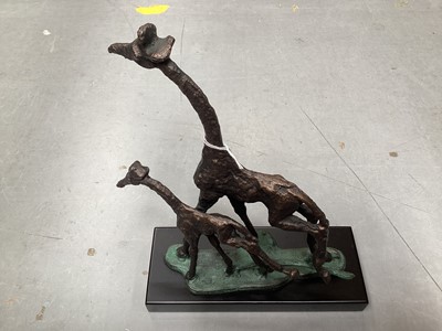 Lot 442 - Abstract metal sculpture of two giraffes, 31cm overall height.