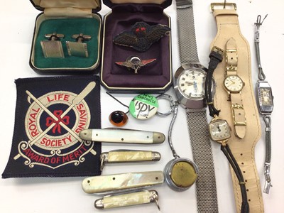 Lot 1034 - G. Q. Parachute Company Ltd war worker's enamelled lapel pin, RAF cloth badge, various wristwatches, penknives, pair of cufflinks and other items