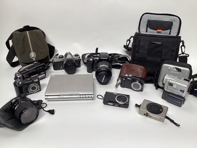 Lot 2363 - Group of cameras, including a Nikon FM SLR, Olympus E-500, Leica V-Lux 20, other digital cameras and movie cameras, and a Sony portable DVD player