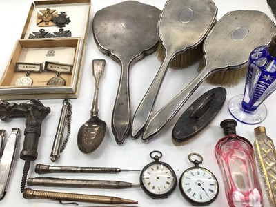 Lot 1072 - Silver backed dressing table set, silver and other pencils, two silver cased fob watches, medallions, glass scent bottles and sundries