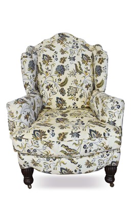 Lot 1338 - Wing chair upholstered in floral fabric