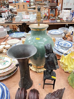 Lot 504 - Bronze sculpture of a Dutch girl, together with a Gu form bronze vase and a lamp base. (3)