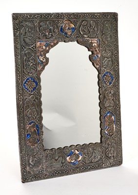 Lot 655 - Middle Eastern silver plate on copper embossed and enamelled mirror