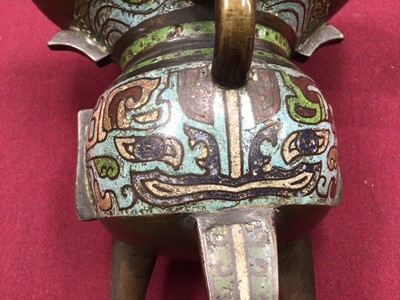 Lot 818 - Chinese champlevé enamel tripod censer with cover
