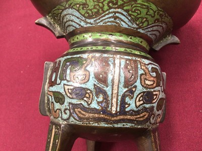 Lot 818 - Chinese champlevé enamel tripod censer with cover