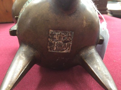 Lot 818 - Chinese champlevé enamel tripod censer with cover