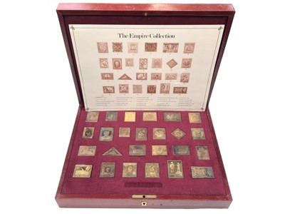 Lot 44 - The Empire Collection set of 25 silver gilt stamps by Hallmark Replicas Limited, set number 2550, in fitted red leather presentation case, with paperwork