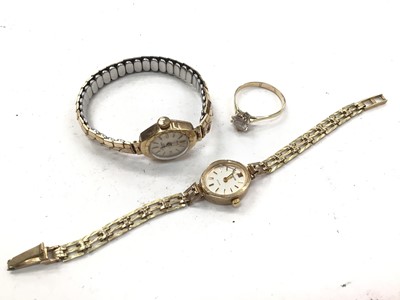 Lot 1112 - 9ct gold ladies Accurist wristwatch on 9ct gold bracelet, 9ct gold cased watch on plated expandable bracelet and a yellow metal synthetic stone ring (3)