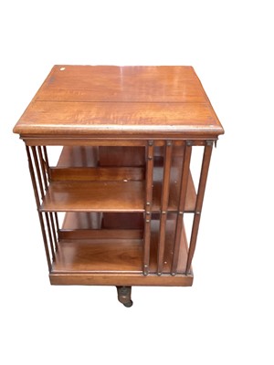 Lot 1246 - Edwardian walnut three-tier revolving bookcase