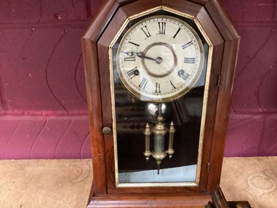 Lot 718 - Late 19th century German wall clock and a Victorian mantel clock (2)