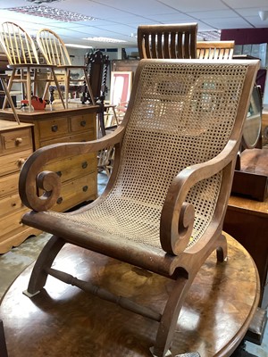 Lot 1282 - X framed begere colonial style chair with matching stool