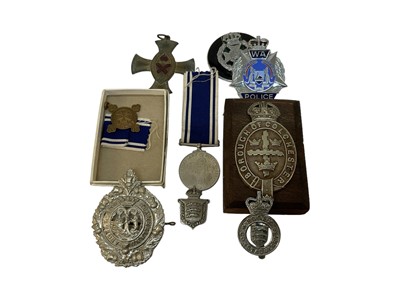 Lot 711 - Elizabeth II Police Long Service and Good Conduct medal named to Const. Clifford. R. Cross, in box of issue, together with Borough of Colchester Police badge and other related badges and items.