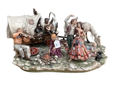 Lot 1145 - Large Capodimonte porcelain figure group - Gypsy encampment