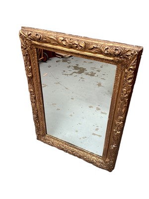 Lot 1293 - 18th/19th century gilt mirror in boldly carved frame