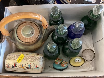 Lot 769 - Two Limoges porcelain boxes, including one with a Dalmatian and another with two ducks, together with a group of coloured glass bottles and other items