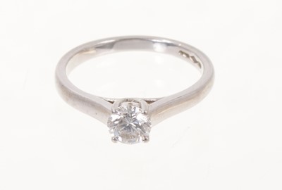 Lot 438 - Diamond single stone ring with a G.I.A. certificated diamond E colour and SI1 clarity