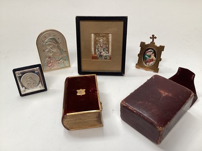 Lot 2630 - Two silver framed Madonnas, one porcelain and another embroidered, together with an antique gilt-tooled bible in case