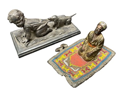 Lot 167 - Cold painted bronze figure of an Arab and a silver plated sculpture