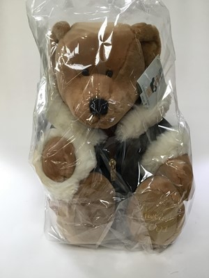 Lot 1828 - Harrods Bears including Millenium 2000 Bear still sealed in box and cellophane, 2000, 2001 and 2002 Christmas bears in cellophane and Archie 2010.