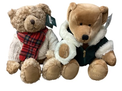 Lot 653 - Harrods Bears including Millenium 2000 Bear still sealed in box and cellophane, 2000, 2001 and 2002 Christmas bears in cellophane and Archie 2010.