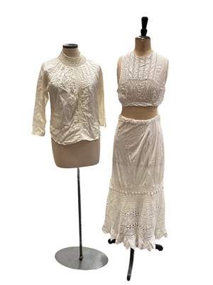 Lot 2104 - Quantity of Edwardian and later white cotton and lace, crochet and broderie anglaise items including women's petticoats, nighties, camisoles. Plus babies Christening clothing, dresses and petti...