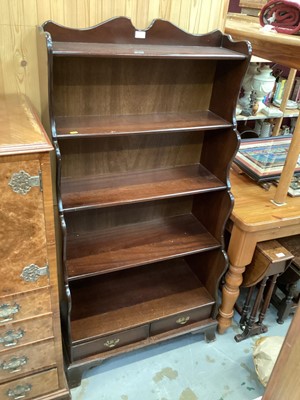 Lot 1211 - Reproduction waterfall bookcase with two drawers below, 79cm wide, 39cm deep, 152cm high