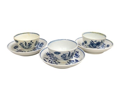 Lot 325 - Three 18th century Worcester blue and white tea cups and saucers