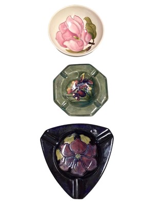 Lot 327 - Two Moorcroft ashtrays and a Moorcroft dish (3)