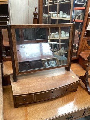 Lot 1237 - 19th century mahogany bowfront toilet mirror with three drawers below, together with another swing mirror, 19th century deployment chair, oval wine table and a stool (5)