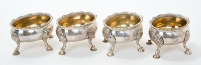 Lot 274 - Set of four George III silver salts by Robert and David Hennell, London 1765