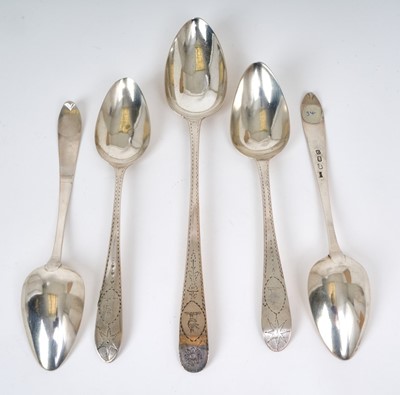 Lot 285 - Matched set of four Irish silver bright cut tablespoons and a large serving spoon