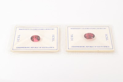 Lot 496 - Two unmounted oval mixed-cut pink tourmalines with certificates