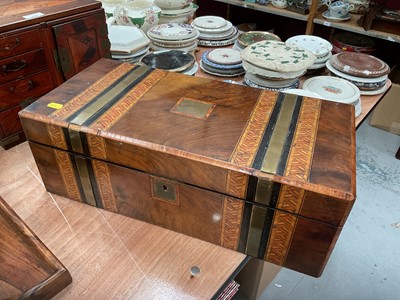 Lot 476 - Victorian walnut brass bound writing slope with parquetry decoration.