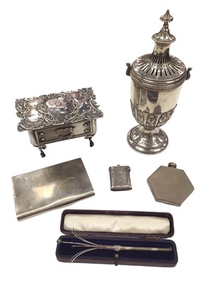 Lot 137 - Edwardian silver trinket box in the form of a table, silver sugar castor, Art Deco silver hexagonal scent bottle, silver vesta case, silver card case and a silver cocktail swizzle stick