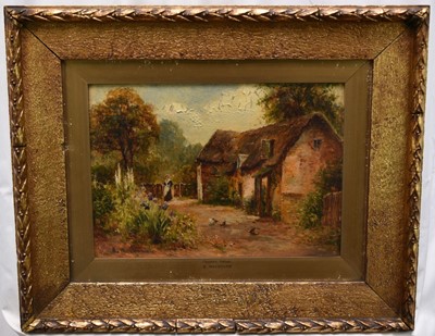 Lot 41 - Earnest Walbourn 1872 - 1927, oil on canvas, lady and her chickens by a Cheshire cottage, signed, in gilt frame. 25 x 35cm.