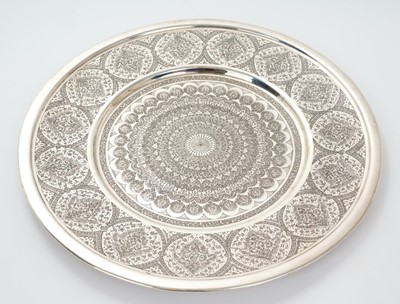 Lot 265 - Middle Eastern plated dish of circular form, with folded rim and Arabesque decoration