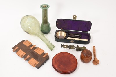 Lot 788 - Assorted works of art including two antique glass vessels, sovereign scales and other items