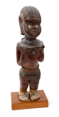 Lot 830 - African carved tribal figure, depicting a woman