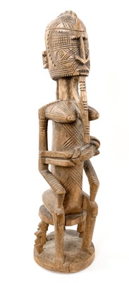 Lot 833 - Antique tribal Dogon carved seated female fertility figure