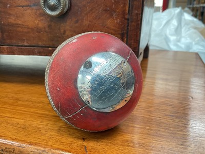 Lot 496 - Presentation cricket ball with applied silver plaque engraved 'B. J. Thompson 'Hat Trick' for Ellesmere Coll. v Rydal School 1951'