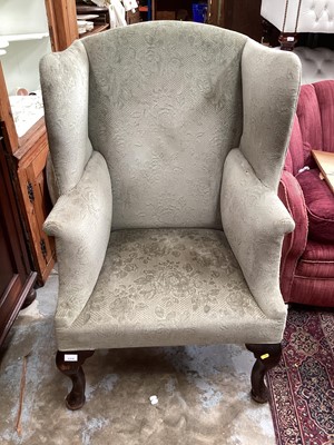 Lot 1318 - Georgian style wing back armchair with green upholstery